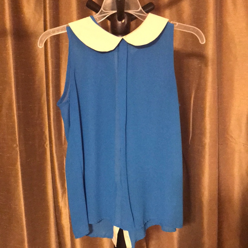 Women’s sheer blue top with Peter Pan Collar